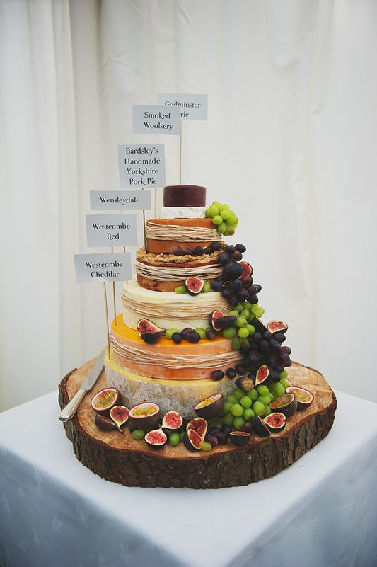The History and Evolution of Cheese Wheel Wedding Cakes - Cheese Wedding Cake Shop